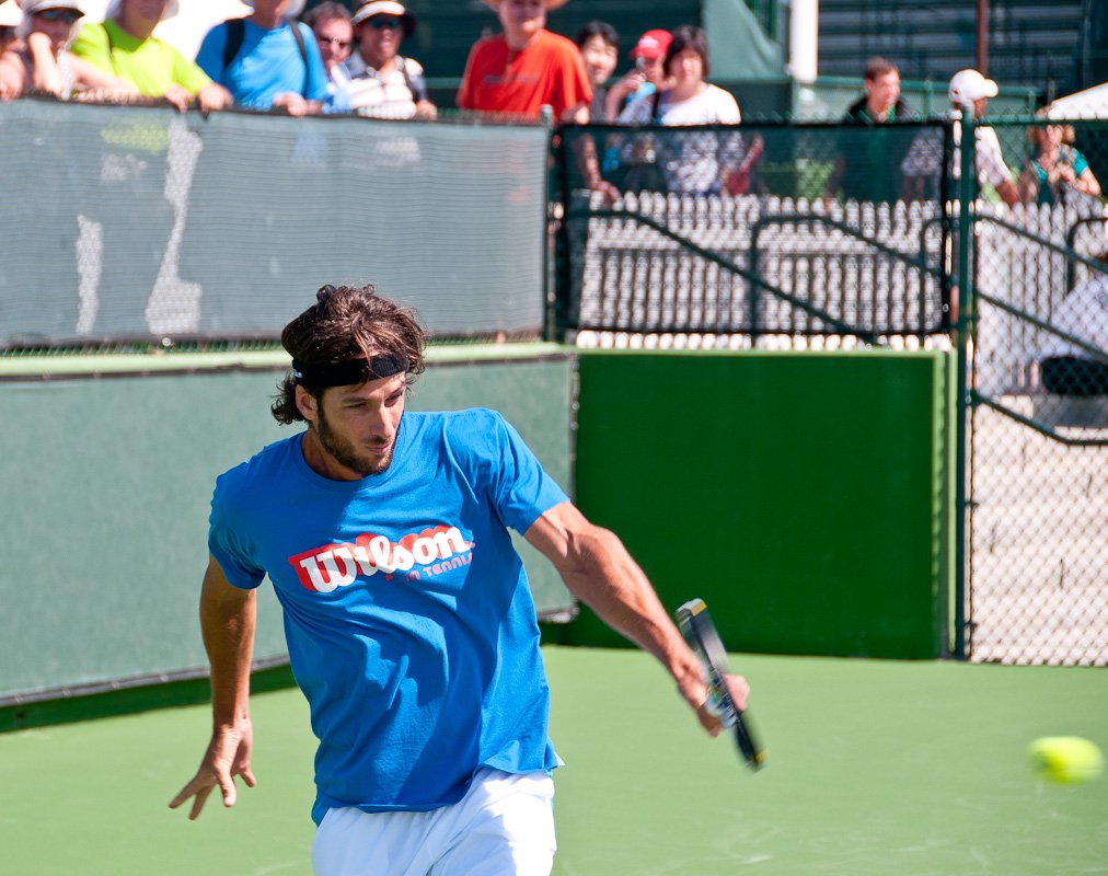 Indian Wells is considered the "5th Major" tennis tournament, after the US, French, Wimbledon and Australian. Here Feliciano Lopez warms up on the practice courts.