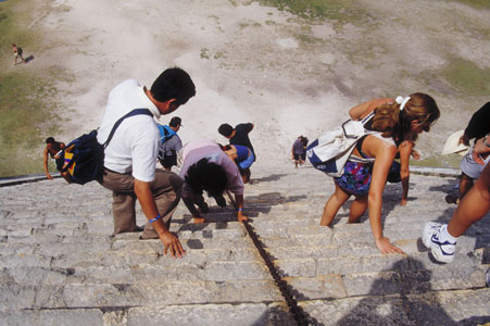 Descending the main pyramid at Chichen Itza, Mexico