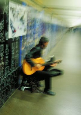 Busker in the subway, Barcelona
